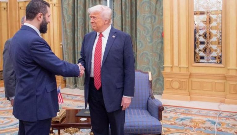 الرئيسان الأمريكي والسوري في لقاء سابق