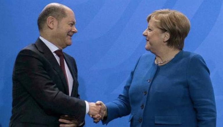 شولتز وميركل- أرشيفية