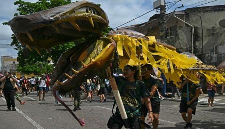 ناشطون في "المسيرة الشعبية العظيمة" على هامش COP30 - أ ف ب
