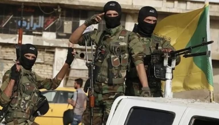 عناصر من أحد الفصائل المسلحة في العراق
