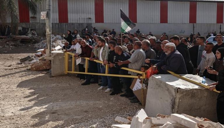  سكان مخيم نور شمس للاجئين بالقرب من طولكرم