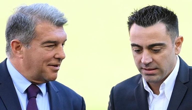 تشافي هيرنانديز وخوان لابورتا