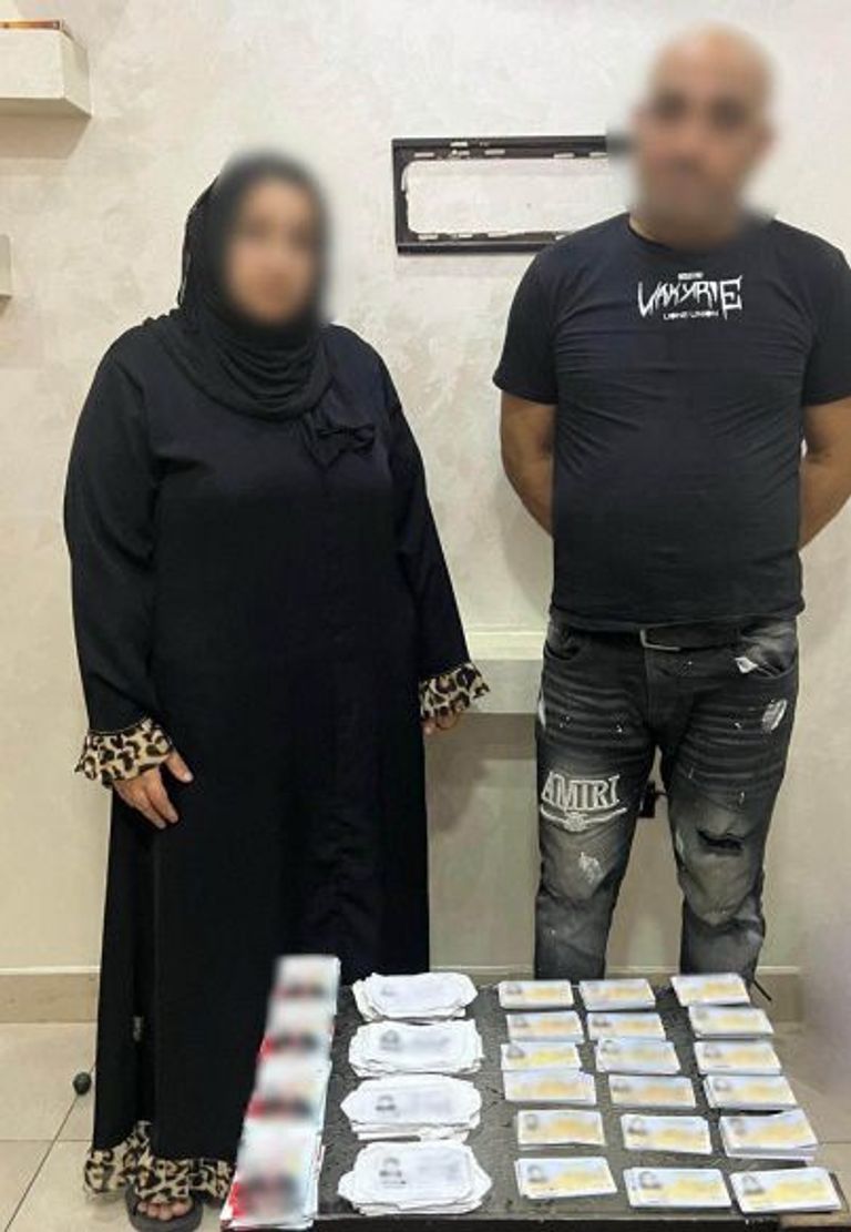 ناخبون مصريون أمام إحدى اللجان الانتخابية بالمرحلة الثانية