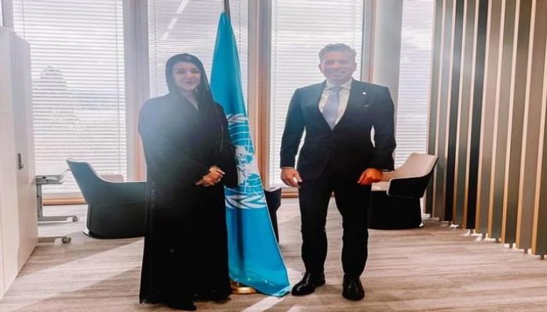  ريم الهاشمي وزيرة دولة لشؤون التعاون الدولي بالإمارات وتوم فليتشر