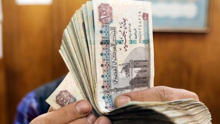 الدولار والجنيه المصري - أرشيفية 