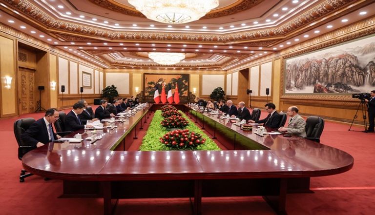 جانب من لقاء ماكرون وشي