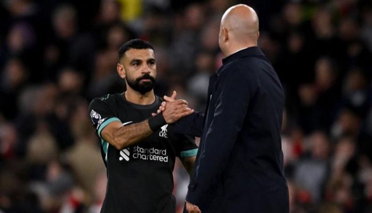 أرني سلوت ومحمد صلاح في ليفربول