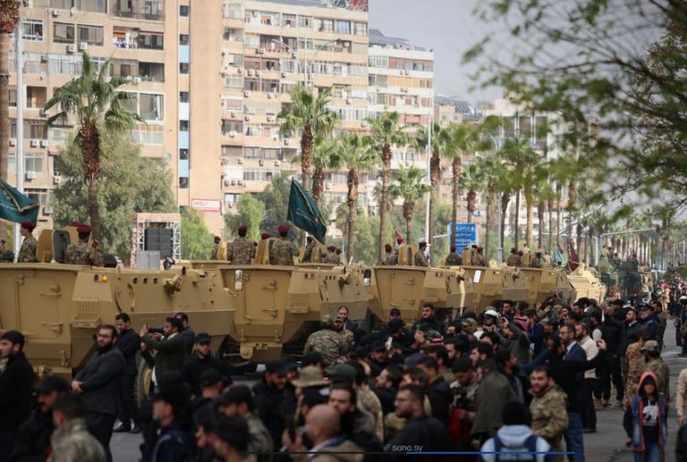 الشرع خلال العرض العسكري- سانا