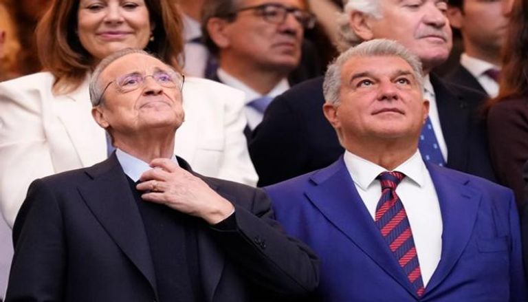 فلورنتينو بيريز رئيس ريال مدريد مع خوان لابورتا نظيره في برشلونة