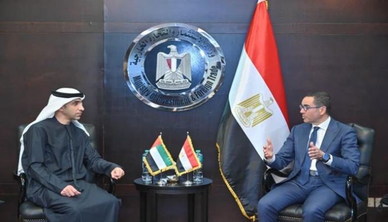 الدكتور ثاني بن أحمد الزيودي والمهندس حسن الخطيب