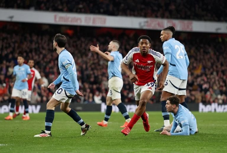 مباراة أرسنال ومانشستر سيتي بيب غوارديولا مدرب مانشستر سيتي