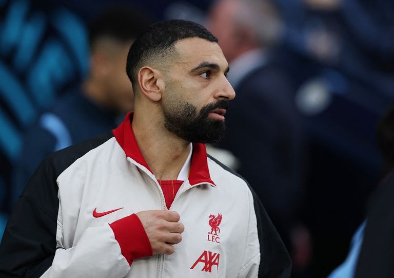 غوارديولا مدرب مانشستر سيتي ومحمد صلاح