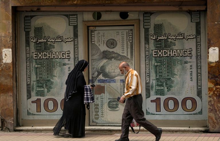 الدولار والجنيه - صورة أرشيفية