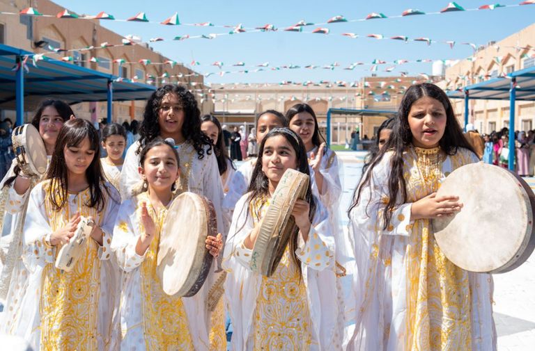 جانب من احتفالات مدارس الكويت