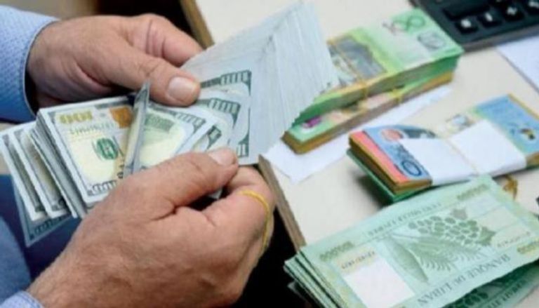 ليرة لبنانية ودولار أمريكي - أرشيفية 