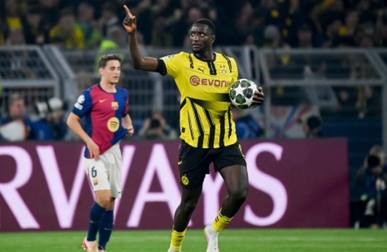 جانب من مباراة بروسيا دورتموند وبرشلونة