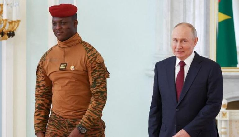 بوتين وتراوري في لقاء سابق