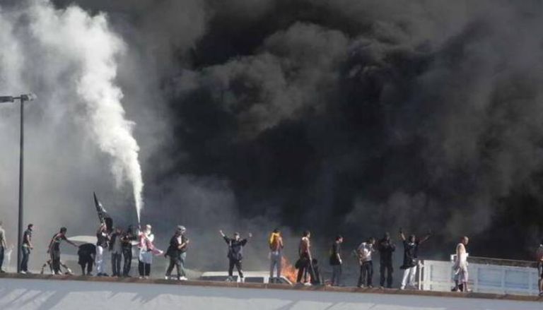 جانب من أحداث السفارة الأمريكية بتونس - أرشيفية