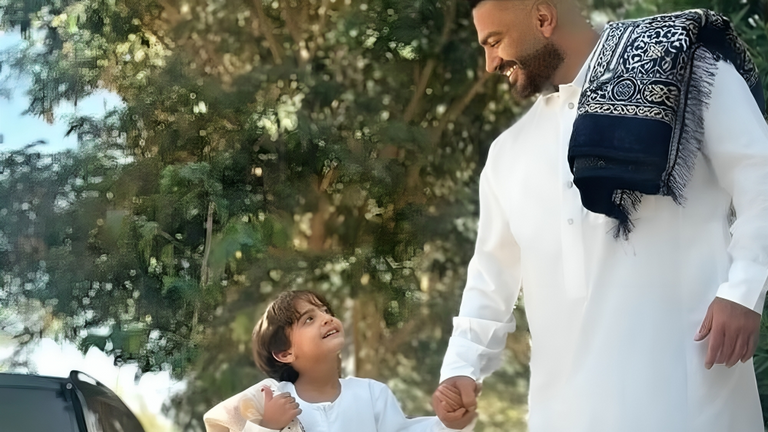 تامر حسني ونجله أدم الفنان المصري تامر حسني