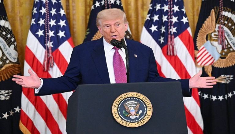 جانب من توقيع الرئيس الأمريكي دونالد ترامب لقرار الإلغاء