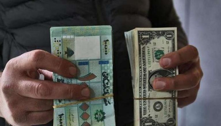 الليرة اللبنانية والدولار الأمريكي - أرشيفية