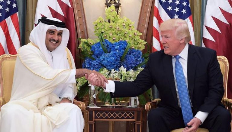 الرئيس الأمريكي وأمير قطر في لقاء سابق