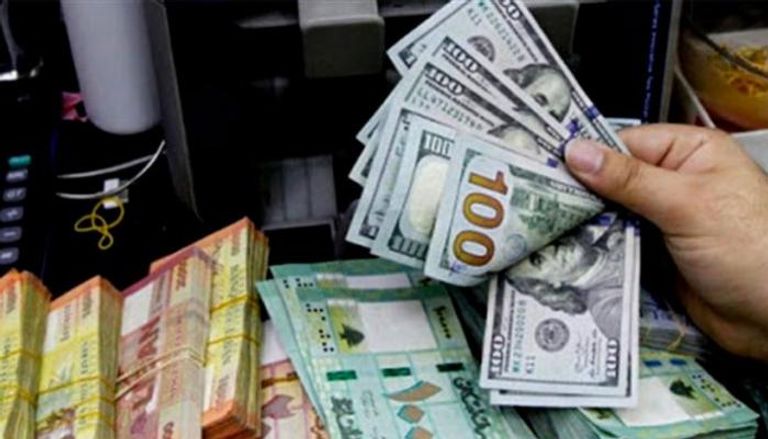 الليرة اللبنانية والدولار الأمريكي - أرشيفية