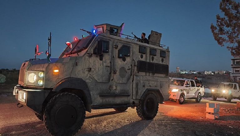 عناصر من وزارتي الدفاع والداخلية السوريتين