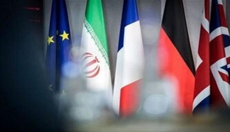 أعلام فرنسا وبريطانيا وألمانيا وإيران والاتحاد الأوروبي