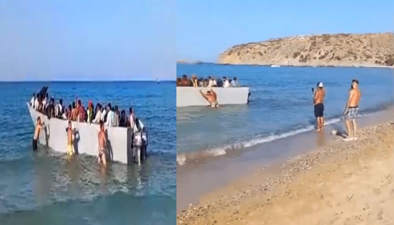 سياح يمنعون قارب مهاجرين من الرسو على شاطئ يوناني