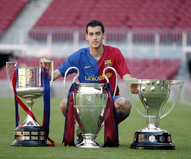 بوسكيتس سيرجيو بوسكيتس وتشافي وإنييستا