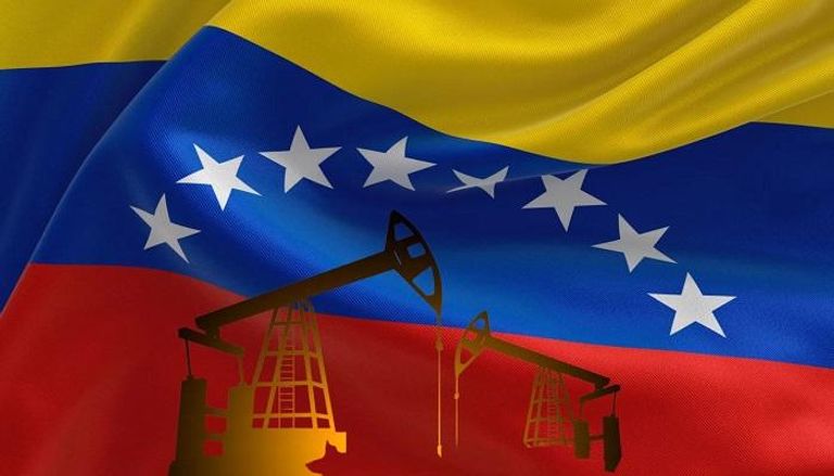 حفارات تنقيب عن النفط وعلم فنزويلا (المصدر: نيوزويك)