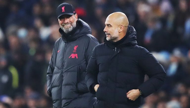 أرسين فينغر وأليكس فيرغسون