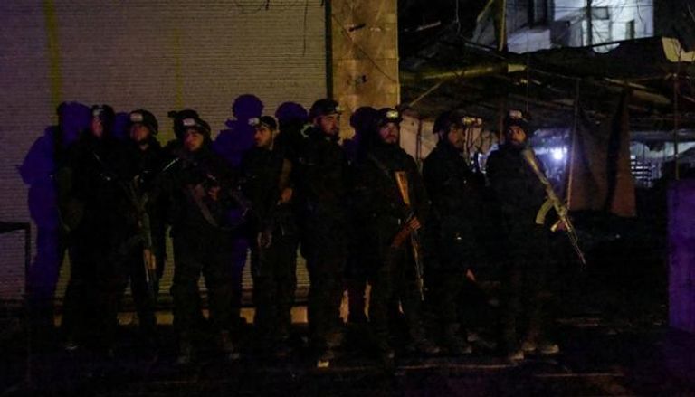 عناصر من قوات سوريا الديمقراطية في حلب