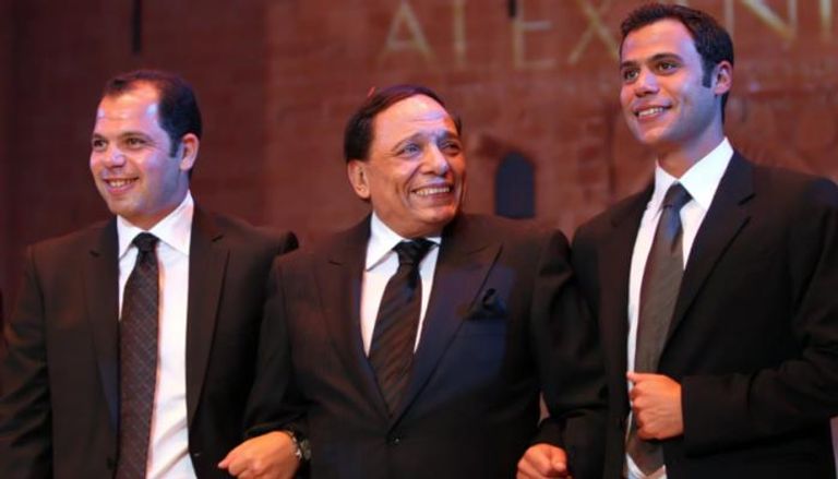 عادل إمام ونجلاه محمد ورامي