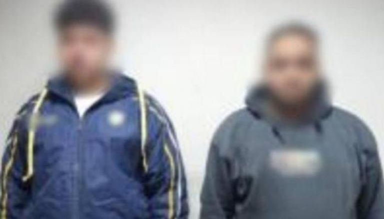 المتهمان في فيديو محل الفيوم