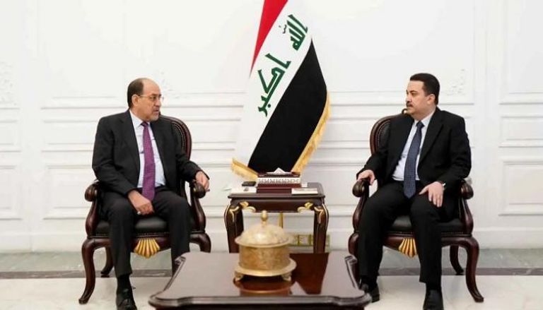 محمد شياع السوداني ونوري المالكي- أرشيفية