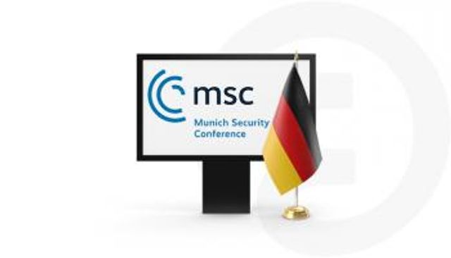 شعار المؤتمر وعلم ألمانيا