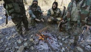 قوات من الجيش السوري - رويترز