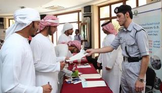 مشاركة شرطة أبوظبي في معرض التوظيف 