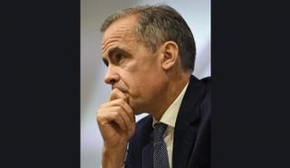 محافظ بنك إنجلترا المركزي مارك كارني أثناء مؤتمر صحفي في لندن