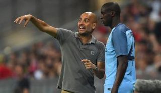 يايا توريه وجوارديولا      