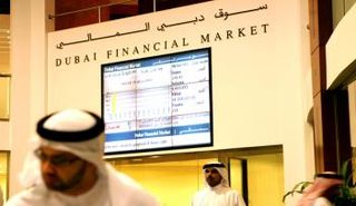 متعاملون في سوق دبي المالي – صورة أرشيفية 