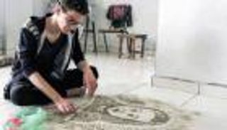 بالصور.. فلسطيني يحول الغبار إلى لوحات .. الطفل عمران أحدث أعماله