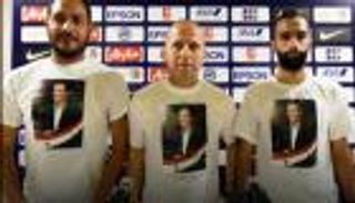 أقمصة بشار الأسد تنقل جدل الأزمة السورية إلى سنغافورة