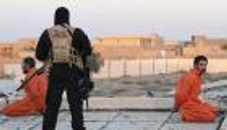 بالصور.. داعش يعدم "الجواسيس" بسلك ناسف