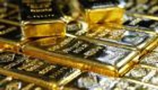 الذهب يصعد من أدنى مستوى في أسبوعين مع تراجع الدولار والأسهم