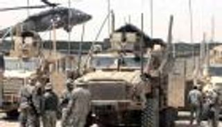 قاعدة أمريكية بالعراق تواجه هجمات داعش وتهديد المليشيات