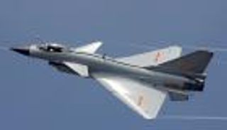 مقاتلة صينية تعترض طائرة تجسس أمريكية بطريقة 