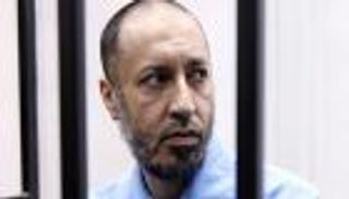 إرجاء محاكمة نجل القذافي.. ومقتل 4 في ضربة جوية شرق ليبيا